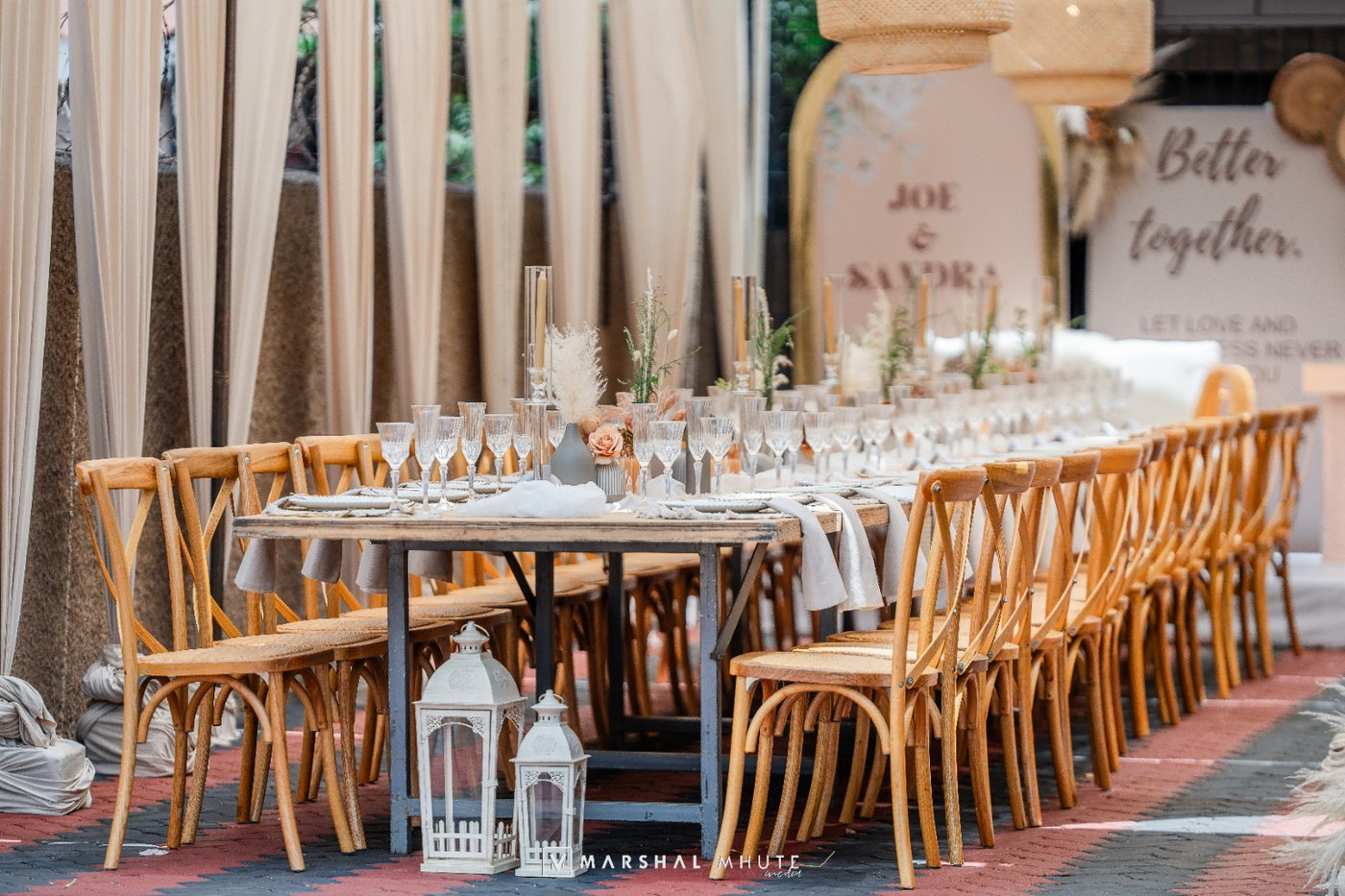 Long dining table with warm event styling