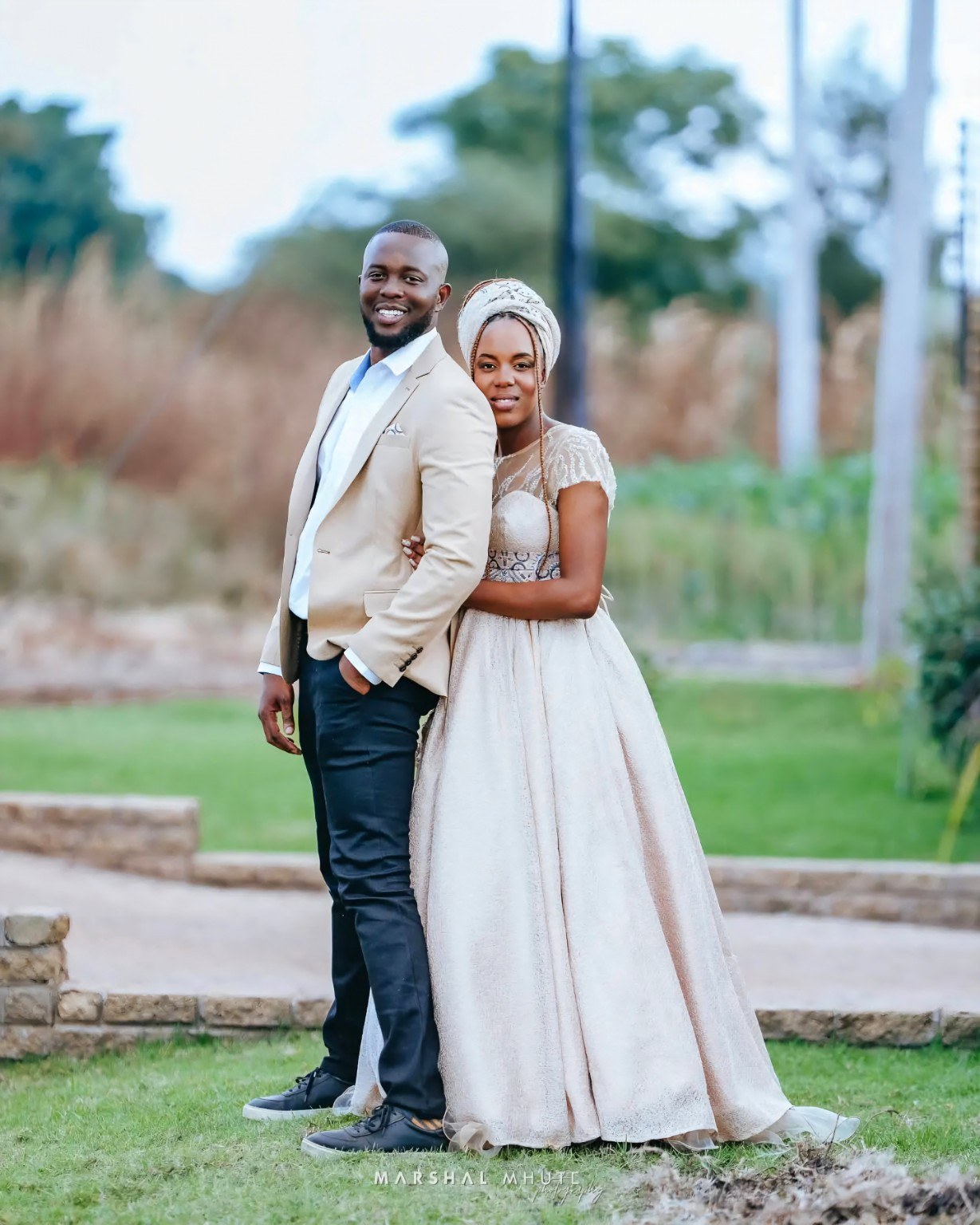 Elegant standing marooro couple portrait in ivory tones